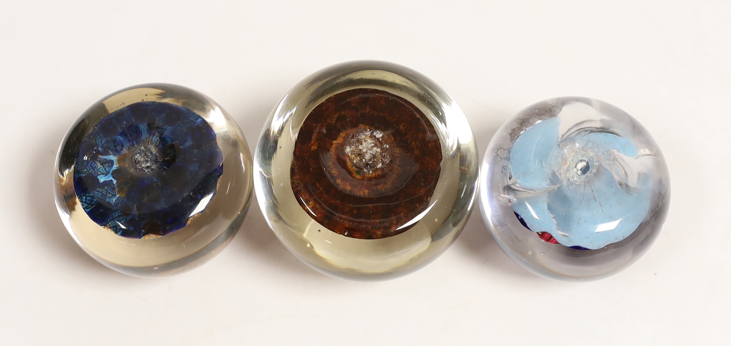 Three paperweights, Perthshire and two others